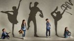 Children casting athletic shadows due to youth sports