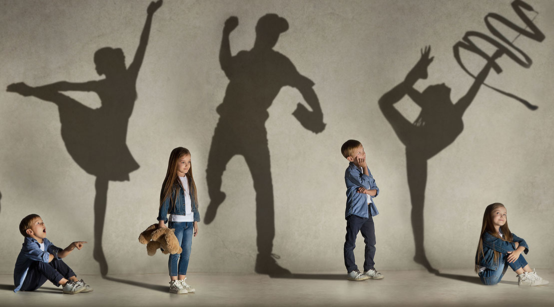 Children casting athletic shadows due to youth sports