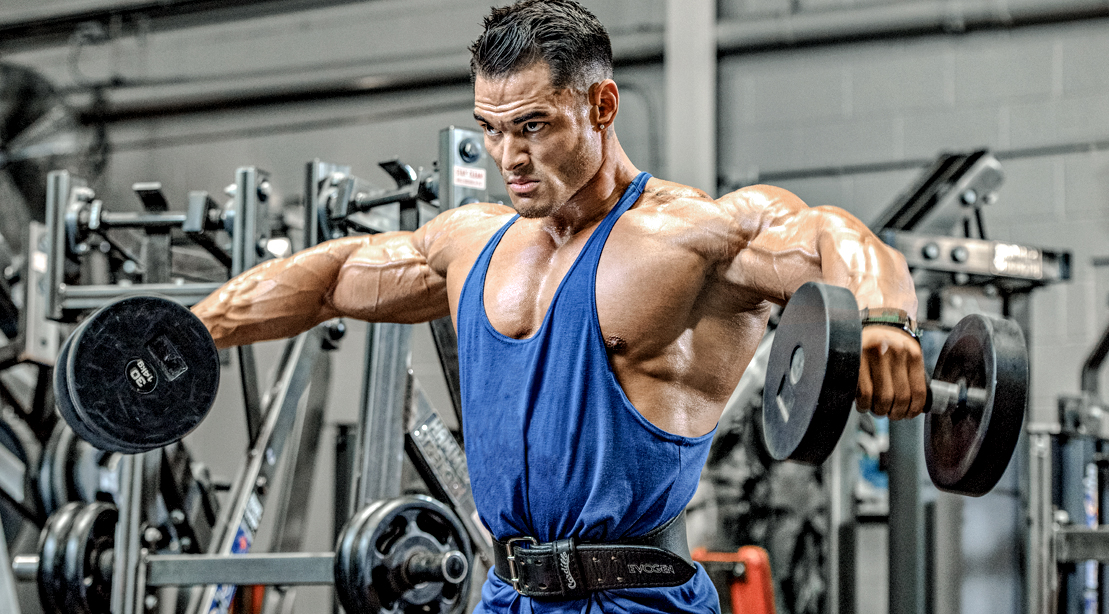 Professional bodybuilder Jeremy Potvin working out his delts with side lateral raise without any lateral raise mistakes