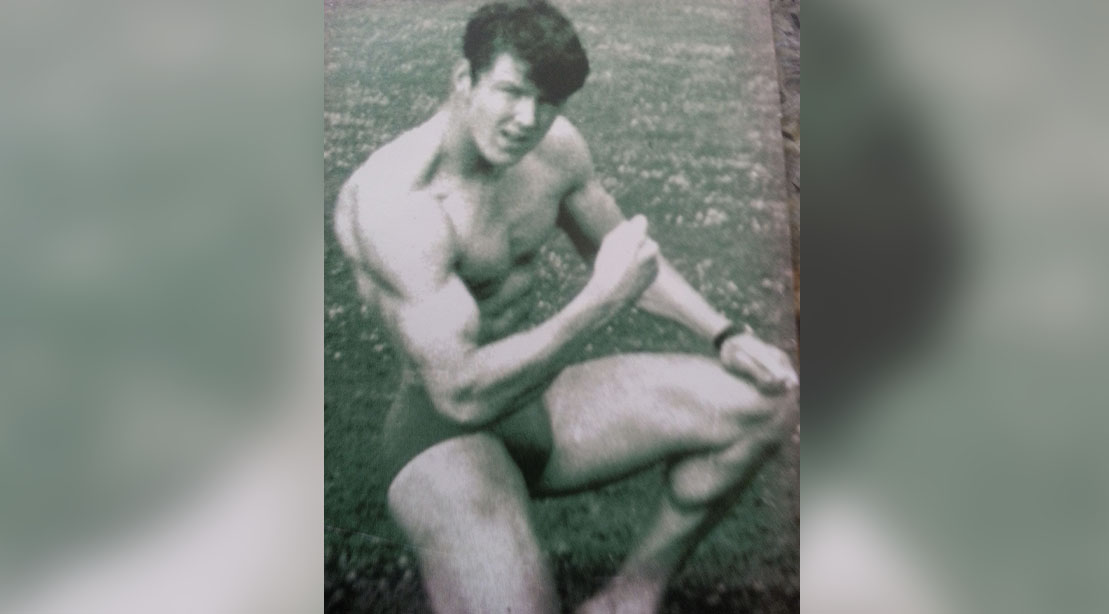 Legendary bodybuilder and MAS wrestler Odd Haugen as a young man doing a kneeling pose