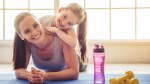 Mother and daughter working out for a Mother's Day workout routine