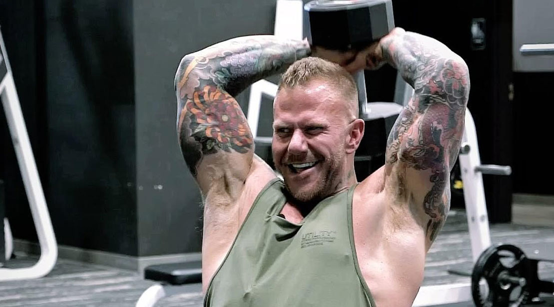 The Sober Bodybuilder Brad Jensen performing a single-arm overhead triceps extensions